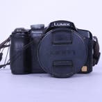 Panasonic Lumix DMC-FZ28 + Charger + Lens Cap + Strap