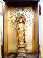 Standing statue of Amida Nyorai enshrined in a shrine -