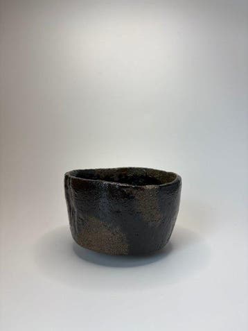 Japanse Raku-keramiek Zwarte theekop “Shichiri” –