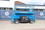 Veiling: Schaarlift Genie GS-4069 RT Diesel 14.30m 2015, Ophalen