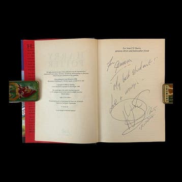 J.K. Rowling / and inscribed by actor Warwick Davis - Harry