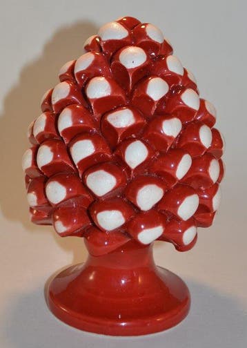 Decoratief ornament - decoratieve dennenappel in rood en wit