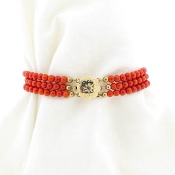Antiek bloedkoraal kralenarmband met gouden sierslot, Gebruikt, Ophalen of Verzenden, Met edelsteen, Goud