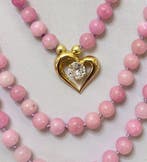 Natuurlijke kunziet met Hart van Christus en Grieks kruis.