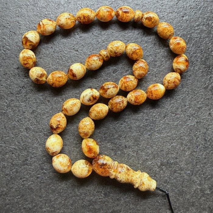 Tasbih-gebed rozenkrans kralen in olijfvorm - Barnsteen -, Antiek en Kunst, Curiosa en Brocante