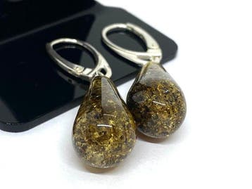 Lichtgevend groenachtig Baltische amber druppeloorbellen -