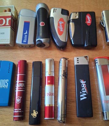 Sans prix de réserve - Briquet de poche - Plastique, Acier