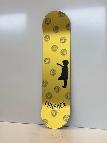 Rob VanMore - Skating by Versace x Banksy