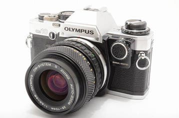 Olympus OM10 / OM-SYSTEM S ZUIKO AUTO-ZOOM 35-70mm f3.5-4.5, Audio, Tv en Foto, Fotocamera's Analoog, Nieuw