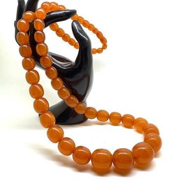Exclusieve art-deco ketting met Baltische barnsteen kralen