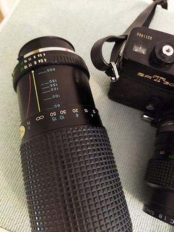Minolta SRT303b + MC Zoom Rokkor 5,6/100–200mm | Analoge, Nieuw