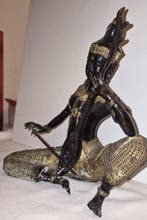 Elegante scultura Thai in bronzo parzialmente dorato -