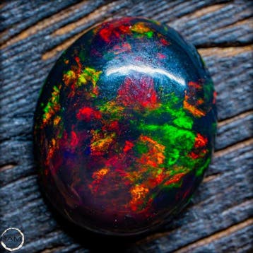 Eerste kwaliteit AAA+++ Zwarte opaal cabochon 4,45 ct- 0.89