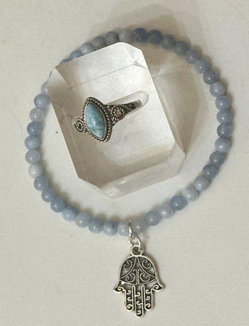 Natuurlijk larimar en aquamarijn uit Brazilië met Hand van