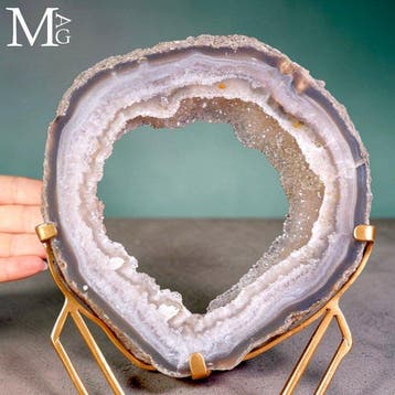 Gelaagde agaat-geode schijf met een sprankelende