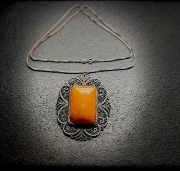 Oud natuurlijke hele steen Baltisch amber hanger en zilveren