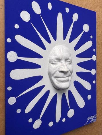 gregos - White smiling splash on blue background