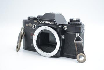 Olympus OM-10 + OM-System E.Zuiko Auto-T 3.5/135mm Single