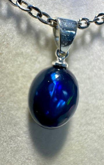 Opaal Cabochon - Hoogte: 19.5 mm - Breedte: 9 mm- 0.8 g -