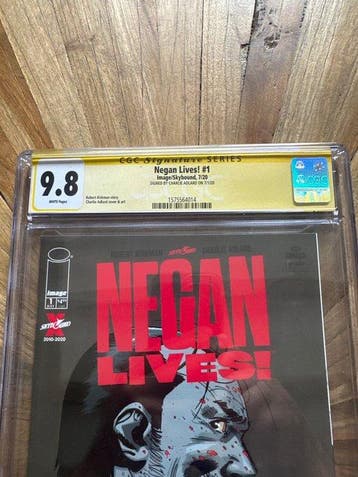 The Walking Dead - Negan Lives ! - 1 Signed graded comic -, Boeken, Strips | Comics, Nieuw