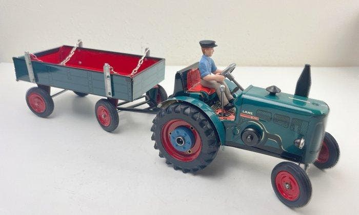 Kovap - Tin wind-up Lanz Bulldog-tractor, trailer en, Antiquités & Art, Antiquités | Jouets