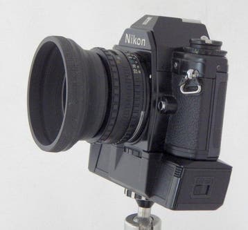 Nikon Nikon EM + MD-E + 1.8/50mm Single lens reflex camera, Audio, Tv en Foto, Nieuw