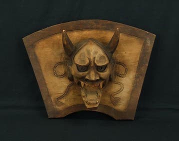 Decoratief ornament - Japan - Ainu houtsnijwerk Hannya