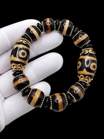 Bracelet tibétain exclusif avec un Dzi en dent de tigre -