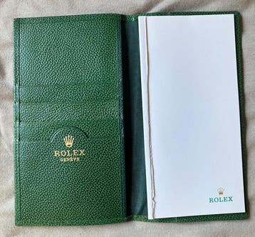 . - Rolex Genève. Kartenhalter mit Notizbuch, grünes