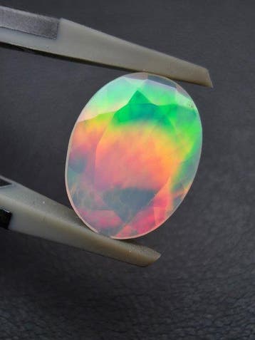 1.94cts White Opal Faceted- 0.4 g