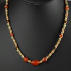 Oude Egypte, late periode Ketting en oorbellen met