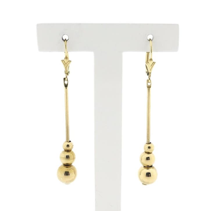 8 karaat oorbellen met bollen, Handtassen en Accessoires, Oorbellen, Geel, Gebruikt, Goud, Ophalen of Verzenden