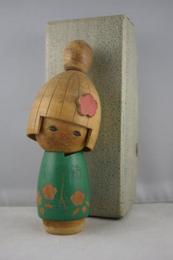 2 vintage kokeshi-poppen door Suigai Sato en Chie Tamura -