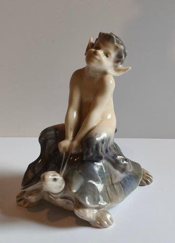 Royal Copenhagen - Beeldje - Faun on Turtle (model 858) -