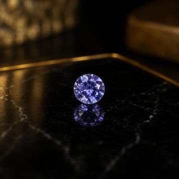 Natural Tanzanite 0.032 ct Round Brilliant Cut 2.0 mm | Heat, Handtassen en Accessoires, Overige Accessoires, Verzenden, Nieuw
