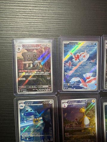 Pokémon - 12 Bulk kaarten - Slowbro, Ampharos, Goldeen, Hobby en Vrije tijd, Nieuw