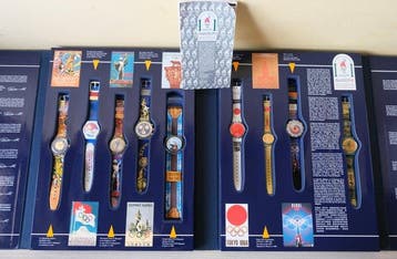 Swatch Historical Olympic Games (Ref. SZS01) - Set 9 Orologi, Nieuw