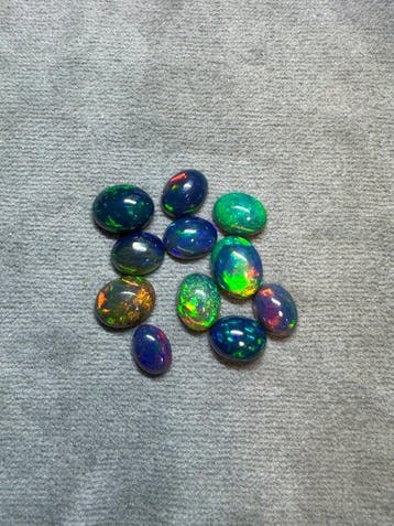 Set van 11 cabochon-opalen uit Ethiopië - 9,75 ct Cabochons-