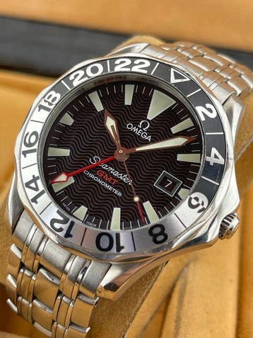 Omega - Seamaster Professional GMT “50th Anniversary” -, Handtassen en Accessoires, Horloges | Heren, Nieuw