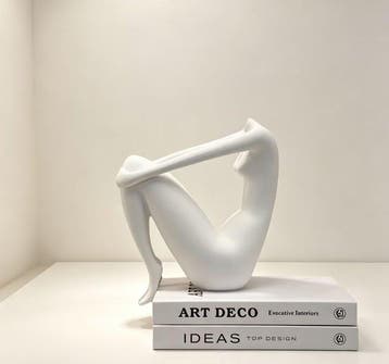 sculptuur, Artistic figurine of a seated figure in a