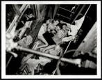 Weegee (1899–1968) - Asleep on Fire Escape During Heat