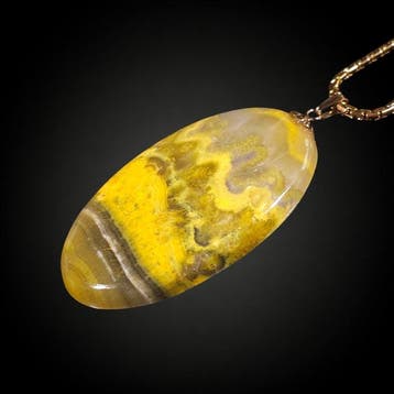 Geen Reserve – 82,2 ct Bumblebee Jasper met levendig