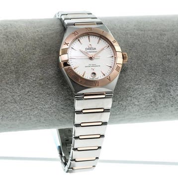 OMEGA – 29 mm, stainless steel – Sedna gold on stainless, Nieuw