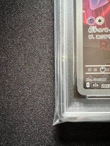 Pokémon - 1 Graded card - Team Rockets Mimikyu 205/193 -