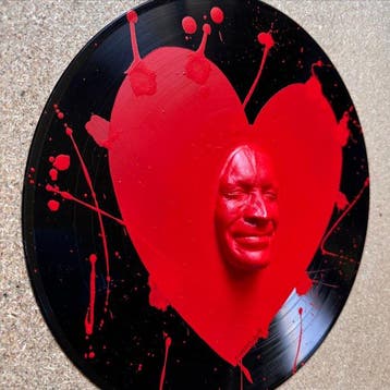 gregos - Red smile heart on vinyl record