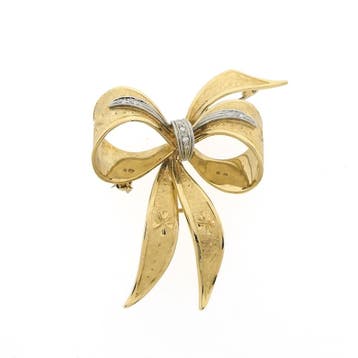 Gouden broche als strik met diamanten; 0,035 ct., Gebruikt, Ophalen of Verzenden, Met edelsteen, Goud