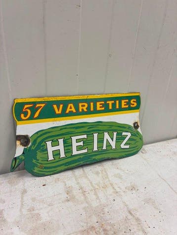 Vintage Heinz “57 Varieties” reclamebord – augurk vorm