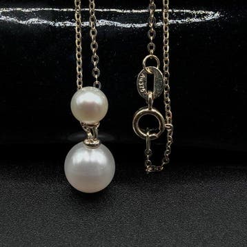 Dubbele Parelketting – Elegant Minimalistisch Ontwerp -