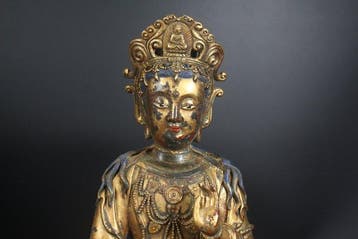 This is a 35cm tall bronze statue of Guanyin Bodhisattva