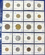 Lot mondial de 60 pièces, plus 14 billets de qualité UNC.